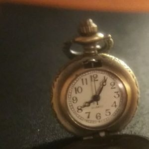 Two miniature pocket watches